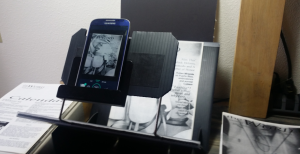 Scanning artsDFW with a Phone and fold-up scanner stand